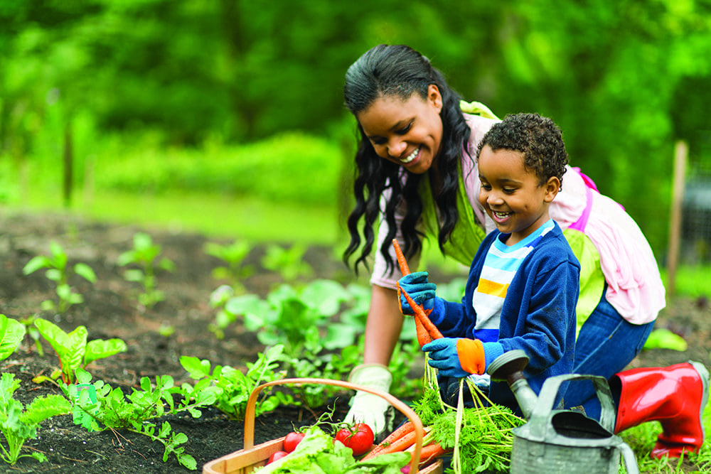 Mom and son living the better life through gardening.