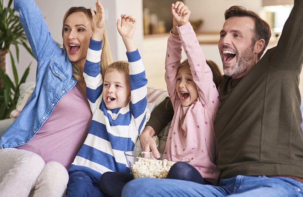 Family Cheering on Team